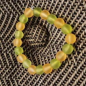 This bracelet is limited edition. It's orange and green